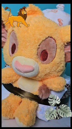 Lion King Diaper Cake #hushlittlebabycakes #babygift #babyshower #baby #diapercake #babyshowergift #lionking #simba #lionkingsimba #lionkingbabyshower #mufasa #nala #simbalionking #lionkingtheme ##genderneutral #itsababy #itsasurprise #genderreveal | Hush Little Baby Cakes & Gifted