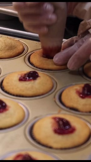 Its your last week to try our bright and beautiful Raspberry Romance Cupcake! The center of each golden vanilla cupcake is filled with a bright raspberry whipped cream, topped with more raspberry cream, and covered with a white chocolate glaze. A lovely pink rose tops each cupcake for a simply beautiful finish.#raspberry #cupcake #raspberrycupcake #bonbonerie #bonboneriecincy #CincyEats #TreatYourself #CincinnatiBakery #SpecialtyDesserts #GiftIdeas #cincybakery #ohiobakery #cincyfoodie | The Bon