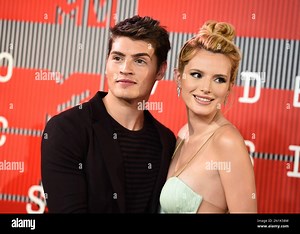 Gregg Sulkin, left, and Bella Thorne arrive at the MTV Video Music Awards at the Microsoft Theater on Sunday, Aug. 30, 2015, in Los Angeles. (Photo by Jordan Strauss/Invision/AP Stock Photo - Alamy
