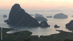 cinematic view of massive limestone islands in Phang Nga Bay Thailand