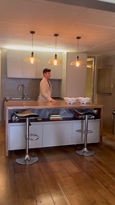 Still scrolling from that apartment with the “quirky” damp corner? Cute. Now imagine ceilings so high they make your ambitions look small. Floor-to-ceiling windows. The city and mountains performing like they pay you rent. Oak floors underfoot. A kitchen so unapologetically elite your guests will go home and open Property24 in silence. Separate scullery. Two water points. Because we don’t rinse champagne flutes where we brush our teeth. There’s a soaking tub for main-character meltdowns. A mezza