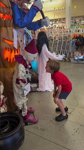 Boy startled by moving clown display in Los Angeles, USA
