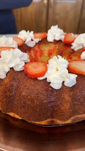 Scrumptious vanilla, strawberry bundt cake Olivia uses white cake mix, insant vanilla jello pudding mix, milk, eggs, oil, vanilla extract, sour cream, strawberry sauce, whipped cream and strawberries to make a yummy dessert. This original video was produced by Jacky and Olivia's Kitchen, Network Media LLC and Olivia | Jacky and Olivia’s Kitchen