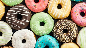 The Legend Behind Why Donuts Have Holes In The Center - Mashed