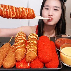 4.1K views · 350 reactions | Eating very cheesy Korean Corn Dogs from Mr. Monster Corn Dogs! Love the cheese pull lol! Have you had Korean-Style Corn Dogs? #mukbang #asmr #cheese #cheesepull #cheesesticks #koreanfood #corndogs #hotdogs #food #foodie #eatingasmr #cheeselover | Peggie Neo | Facebook