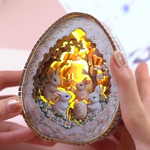 34 reactions |  Hop into Easter Magic with Woodbests!  Unveiling our EGG-CITING 3D Puzzle Night Light—Easter Edition! ✨ Dive into spring with enchanting scenes like Bunny Cottage Gardens, Pastel Egg Laneways, and Blooming Meadow Nooks. Each kit blends whimsical charm with intricate craftsmanship, turning your puzzle-building adventure into a festive decor masterpiece. Perfect for family bonding or gifting! | Woodbests | Facebook