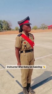 Ghana National Fire Service female instructor puts on a display of the appropriate salute drills for fire service personnel. @highlight | Bỳte Sieh Samuel