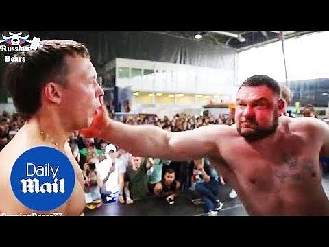 Men aggressively slap each other in Russian strength competition
