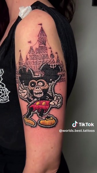 Color realistic patch embroidery style Mickey Mouse Disneyland tattoo tattoo artist Eduardo Barreto #tattooartist #colortattoo #mickeymouse #disneyland #embroidery #patches #patchtattoo #worldsbesttattoos #besttattoos #tattooideas