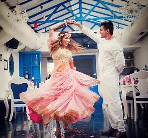Bipasha Basu and Karan Singh Grover rekindle their romance, Bollywood style at the mehendi ceremony--watch video! | Bollywood Life