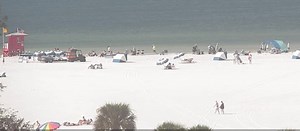 The view this morning on the "Our House at the Beach" LIVE cam. Temps are about in the mid 70s this morning and there is plenty of sunshine. Yellow flag posted/ Red tide in the area. Get the full beach report including the red tide report and information at www.SiestaBeach.report | Siesta Key