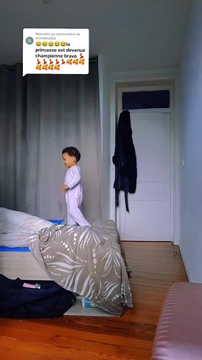 Playful Child Dancing in a Cozy Bedroom