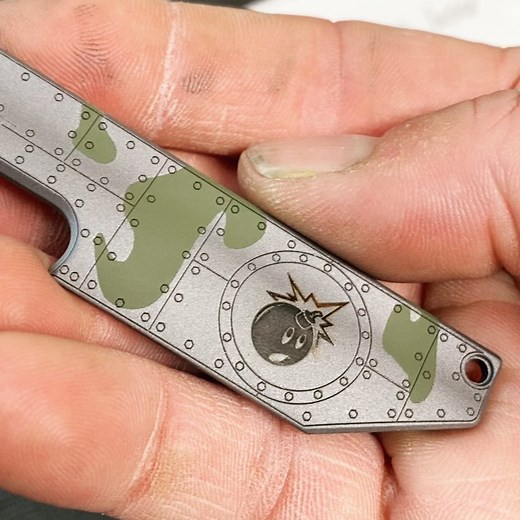 D Rocket Design on Instagram: "Shark Revenge folder with Bomb Boy emblem. Brent @blackwidowknifeworks and I work well together. Stay tuned for more designs."