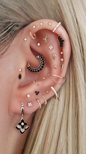 Elevate your style with these bohemian ear piercing curation ideas featuring stunning black cartilage earrings for that edgy yet elegant look!🖤✨ . . . . . #earpiercings #earrings #piercings #earringsofinstagram #earringstyle #curatedear #earringshop #earringaddict #earringswag #earringstagram #cartilagepiercing #traguspiercing #helixpiercing #jewelry #piercinggirl #daithpiercing #conchpiercing #rookpiercing #earcuration #cartilagepiercings #earstack #earstyle #earstylist #newpiercing #earpierci