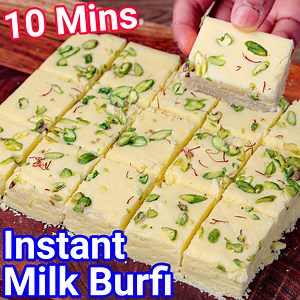 Instant Barfi: bit.ly/2o4ZtPR Gulab Jamun: bit.ly/3eUtIkj Milk Powder Burfi Recipe | Instant Barfi in 10 Mins | Milk Powder Recipes with step-by-step photo and video recipe. Milk powder is a source of many basic and premium sweets in Indian cuisine. It can also be used to prepare many traditional Indian sweets and dessert recipes that take a lot of time and energy. Commonly milk-based burfi is prepared with milk solids like khoya or mawa. However, this is a cheat version prepared with a combinat