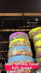 ✨🍩DONUT BATH BOMBS🍩✨ These Sprinkle Donut Bath Bombs bright, fun and smell amazing! Hand-pressed with epsom salt and shea butter for the ultimate bath experience. Available in different neon colors and scents for only $5.99. | Amarillo Candle Company