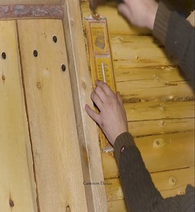 On a cold winter night in the small log cabin situated in the Canadian wilderness. | Cameron Davies