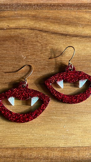 The vampire lip earrings! Also comes in holographic pink!! . . . #earrings #earringstyle #earringshop #earringsoftheday #resinearringsmaking #earringsofinstagram #earringslover #earringsaddict #earringshandmade #handmade #handmadejewelry #handmadewithlove #resinart #resinearrings🌷 #resinjewellerymaking #luckyladybugwishes #resinjewelry #resin #resinearrings #vampire #halloween #halloweenearrings | Lucky ladybug Wishes