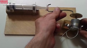 How to make a simple DIY air pump with a syringe and motor | Easy science project