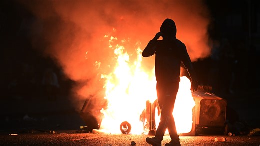 Yobs hurl petrol bombs and fireworks at cops in FIFTH night of riots