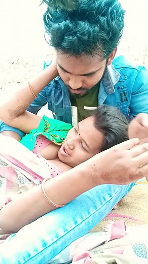 Bhojpuri Actors in an Outdoor Romantic Scene
