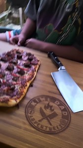 Kiwi Family Pizza night 3 Pizza made 3 ways by dad and the kids . Who did it best ?? All cooked on the Traeger with home made dough 1 Smoked Venison Sausages, Salami, Red Onion Mozzarella Cheese 2 Classic Mozzarella and Cambert Cheese, Garlic Herb Sauce 3 Smoked Chicken Supreme, Mozzarella Cheese, Mushrooms, olives and elso much more . Traeger Grills NZ #Pizza #bbq #woodfiredpizza #pizzanight #food #foodie | Kiwidad Adventures