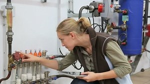 Young Woman Controlling Water Level Machinery: стоковое видео (без лицензионных платежей), 10590725 | Shutterstock