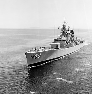 TYPE 12 PORTFOLIO 1961-1998: HMAS SWAN [III]and the dolphins. Photo RAN.
