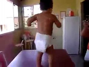 Baby in diaper dancing