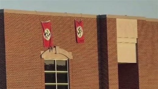 Rockwall County residents rally against hate after Nazi flags appeared at Rockwall-Heath High School. | WFAA