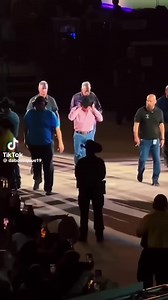 Pink Cowboy Hat Guy Escorted by Bodyguards! Witness the spectacle! A celebrity in a pink shirt and cowboy hat strolls through a cheering crowd, escorted by his entourage. This chapter sets the stage for an unforgettable journey. Don't miss the action! #CelebrityLife #CelebritySpotting #Extravaganza #PublicAppearance #CelebrityStyle #PinkShirt #CowboyHat #Entourage #Crowd #ViralMoment | Bytesizenetwork | Facebook