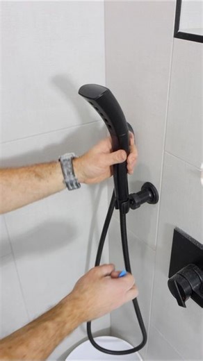 Home Repair Tutor on Instagram: "Shower wand installation tips…I get the diamond hole saw up to full speed then groove it into the porcelain. I slowly raise it to 90-degrees and complete the hole. The final step is to add silicone to the holes before adding the shower wand. This full tutorial is inside our Video Library for Gold and Platinum members at homerepairtutor.com 👍🏽#tile #renovation #homerenovation #work #showerremodel #getitdone"