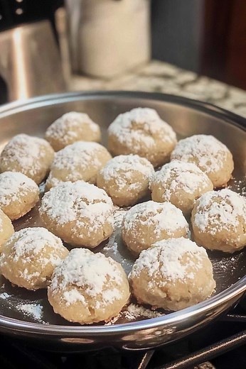 🎄🍪 Buttery Pecan Snowball Cookies 🍪🎄 Get ready to dive into the magic of the holidays with these melt-in-your-mouth, buttery pecan snowball cookies! 🥰 Perfect for gifting, sharing, or enjoying with a cozy cup of tea or coffee. Made with finely chopped pecans, a hint of vanilla, and a dusting of powdered sugar "snow," these little treats bring warmth and sweetness to every bite. ❄️✨ Recipe Highlights: - 🌰 Crunchy pecans - 🧈 Rich, buttery flavor - ❄️ Rolled in powdered sugar for a snow-kiss