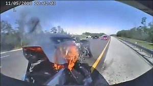 WATCH: A Florida state trooper took a big hit from a car on Interstate 75, but got out to help the man out of his burning car. STORY: https://www.wthr.com/1979966 | WTHR-TV