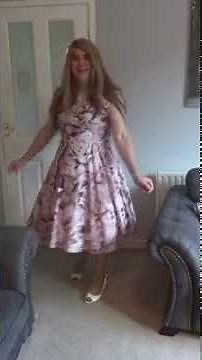 Very girly dress and heels. (Crossdresser/Transvestite)