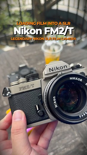 The Nikon FM2/T is a legendary 35mm film SLR camera known for its durability, precision, and mechanical reliability. Released in the 1990s, the "T" in its name stands for Titanium, referring to the top and bottom plates, which give it extra strength while keeping the body lightweight. #filmphotography #nikon #nikonfm2t #nikonfm2 #nikonphotography | The X Cameras