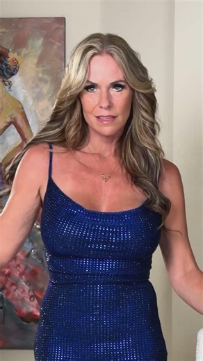 Just a girl in a sparkly blue dress asking.....