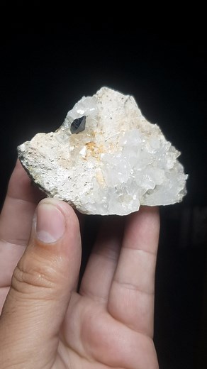 A flawless Anatase crystal rests atop a quartz matrix, sourced from Kharan, Balochistan, Pakistan. The Anatase crystal displays sharp facets and a deep blue hue, contrasting against the white quartz backdrop. Crystal size 1 cm ( damage free) Price :$ 60 + shipping | Artistic minerals | Facebook