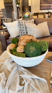 These moss and wood balls are one of our favorite styling secrets! They add the perfect pop of green and natural texture that works in any room. Perfect for bowls, trays, or shelves! #ThePorchWildwood #DecorTips #InteriorInspo #MossBalls #ShelfStyling #NaturalDecor #HomeDetails #TabletopStyling #GreeneryGoals #TextureAndTone | The Porch in Wildwood | Facebook