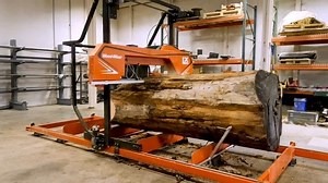 Wood-Mizer introduces the LX250 wide slab sawmill designed for sawyers and woodworkers that need to saw massive slabs and board. For more information contact us today! | Wood-Mizer
