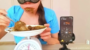 Woman eating scat as quickly as possible