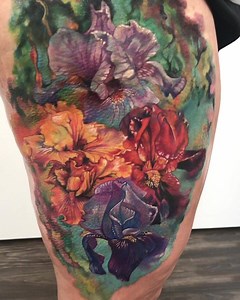 Finished this up the other day! Super fun abstract and Iris flower morphs! #rebelmusetattoo #lizcooktattoo | Liz Cook Tattoo