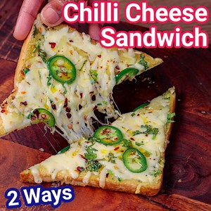 Chilli Cheese Sandwich Recipe 2 Ways - Toast & Grill Street Style: bit.ly/2Q5fDGw Nylon Khaman Dhokla Recipe: bit.ly/48o3dB4 Chilli Cheese Sandwich Recipe 2 Ways | Cheese Chilli Sandwich Toast with detailed photo and video recipe. A simple and unique way of preparing the cheese and green bell peppers stuffed sandwich which is later grilled to crisp and served with extra cheese toppings. A popular sandwich street food from the busy Mumbai streets has a combination of flavors to offer. It is typic