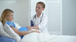 Professional Doctor Touching Pregnant Woman Tummy Stock Footage Video (100% Royalty-free) 1035989003 | Shutterstock