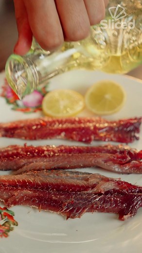 Who said sardines had to be boring? Spice up your life with this delicious homemade pickled sardine recipe! Tired of the same old sardines? Spice things up with this homemade pickled recipe! Get ready to add some zing to your mealtime routine. #PickledSardines #YumYum #asmr | Sliced
