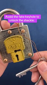 Avoid the fake keyhole to unlock this puzzle lock. #puzzles #puzzle #puzzlesolving #puzzlemaster #lock | Puzzle Master Inc.