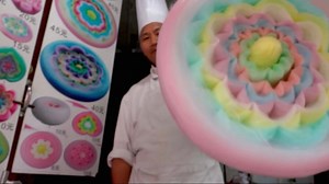 27K views · 199 reactions | Watch this GIANT cotton candy flower be made from start to finish! ☁️ It took 10 minutes to make this MASSIVE candy flower 勞 It cost 50 RMB (around $8 USD) Filmed in Chongqing by @aden_films | Foodporn | Facebook