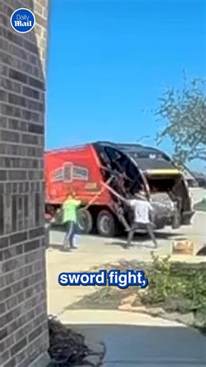 Epic sword fight on the job | Daily Mail Video