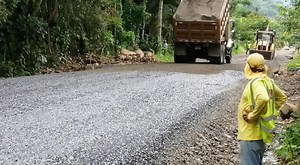Construction Scene: Dump Truck Unloading Gravel