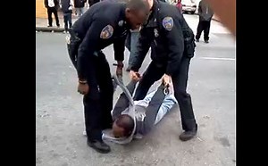 Middle Aged Man Attacks Baltimore Police Officer While Arresting Someone Else!